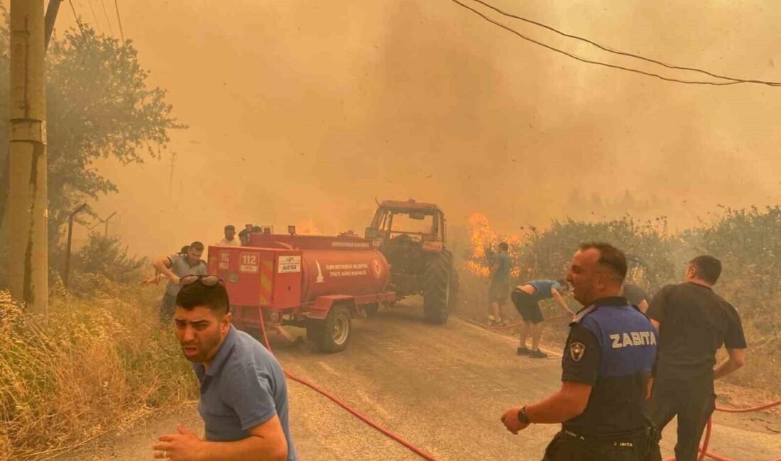 İzmir’in Menderes ilçesinde, saat 13.00 sıralarında başlayan orman yangını devam