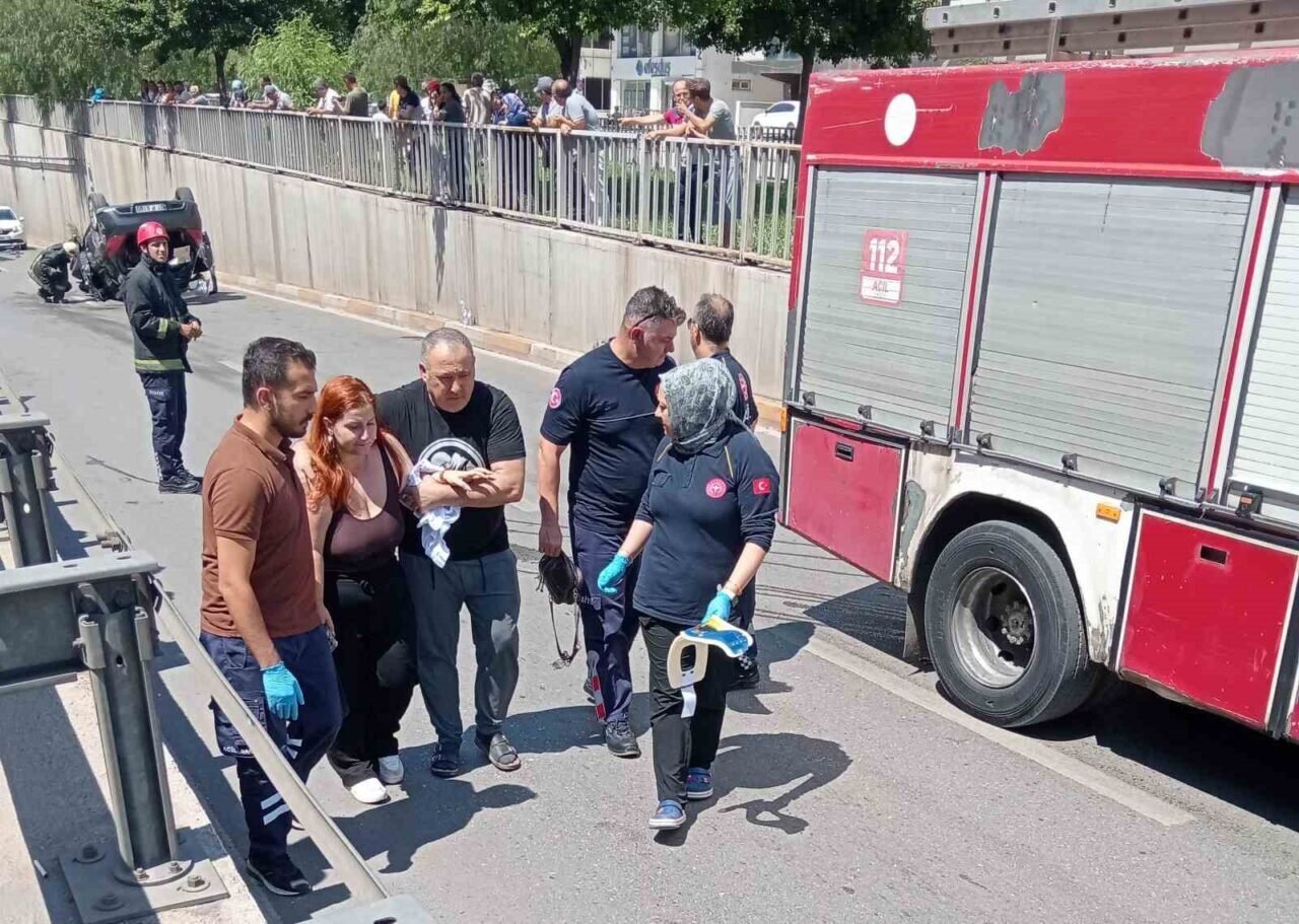 Takla atan araçtan burnu bile kanamadan çıktı Takla atan araçtan burnu bile kanamadan çıktı